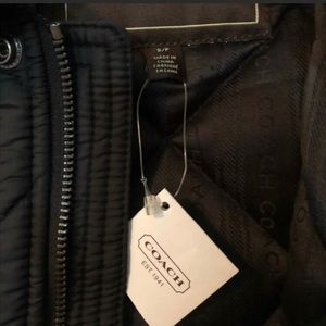 Coach puffer jacket. Light,but still warm.